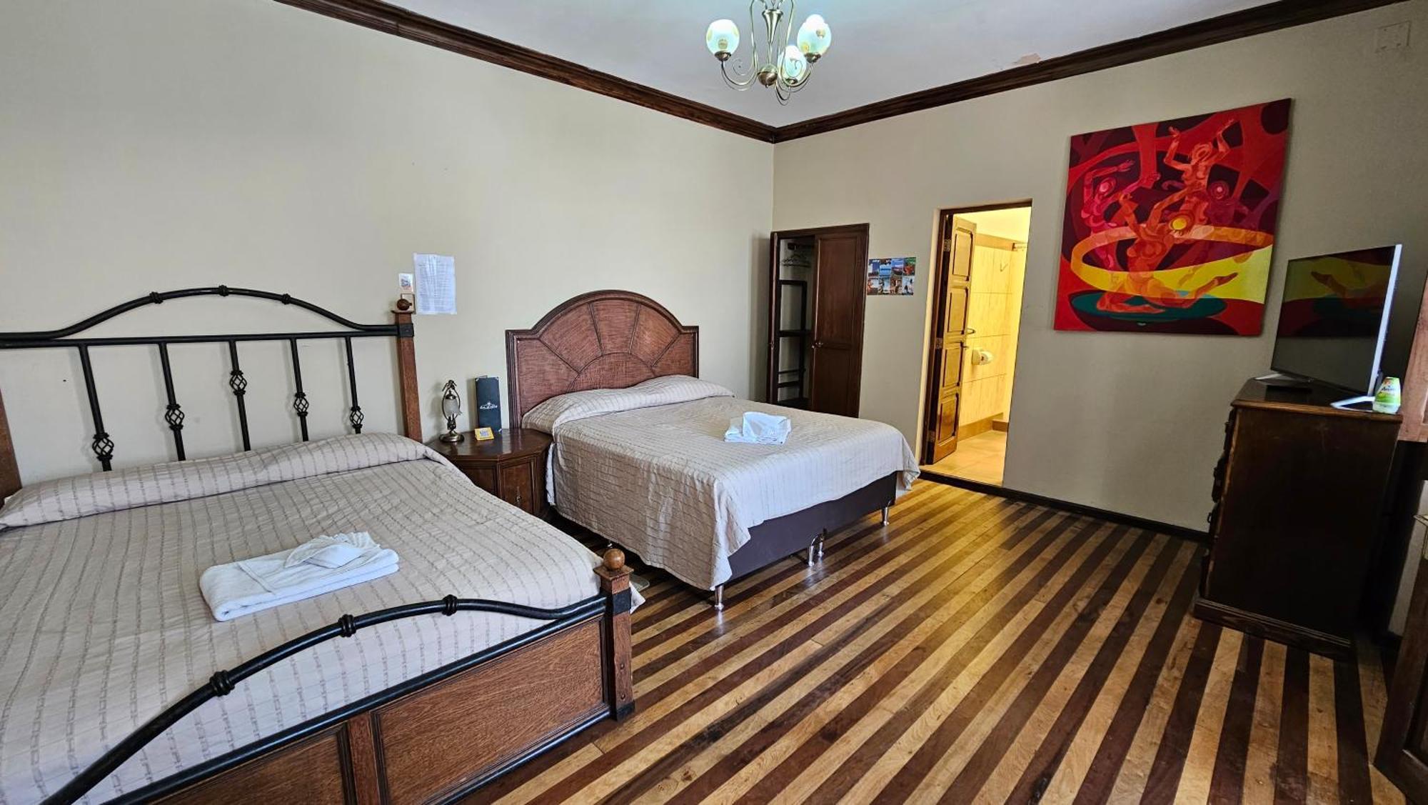 Hotel La Culta Hostal & Centro Cultural Sucre Pokoj fotografie